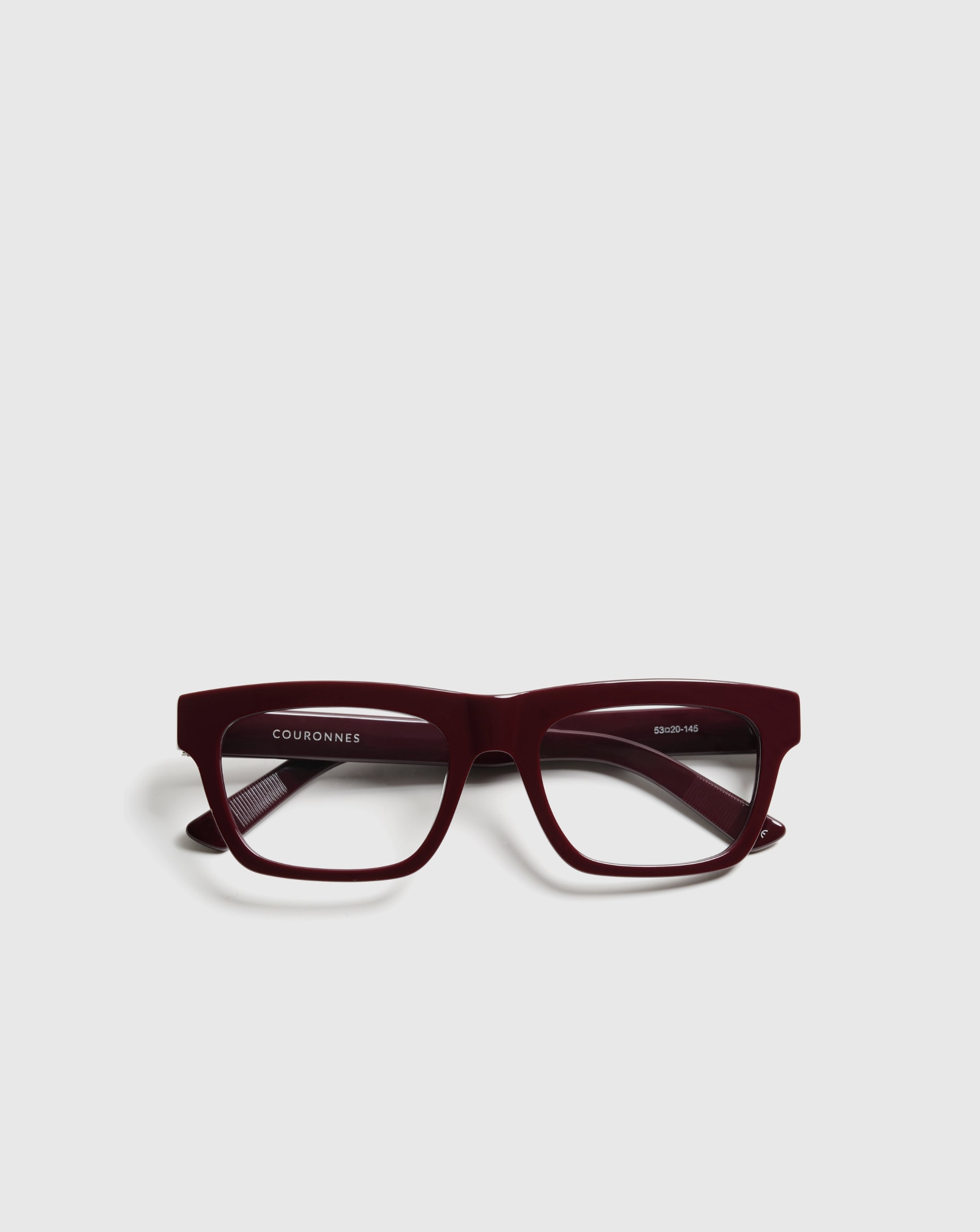 Détail charnière logo Darbary lunettes de vue Couronnes rouge bordeaux
